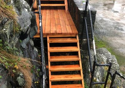 Newly built wooden stairs by a company that also makes wooden porches in the UK